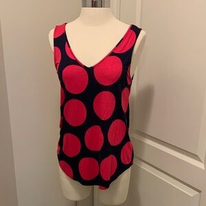 Sleeveless V-neck tank top navy blue with large pink polka dot pattern